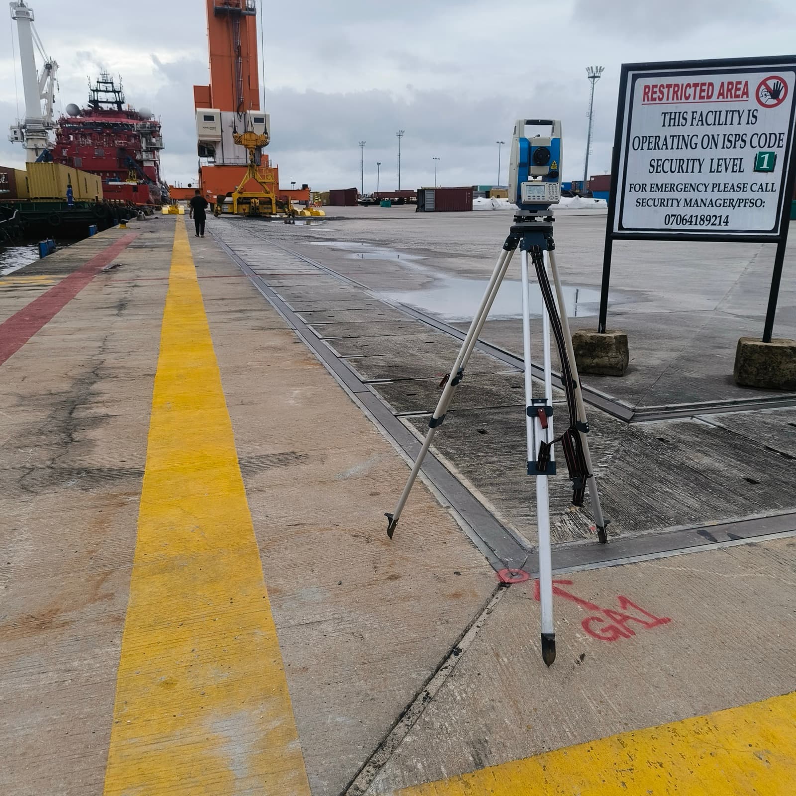 Total station survey on a tripod during a land control survey